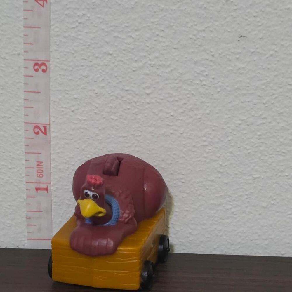 chicken run toy with yellow beak and blue collar #chicken #vintage